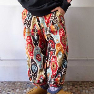 Amina Pantalon polaire à motif bohème vert